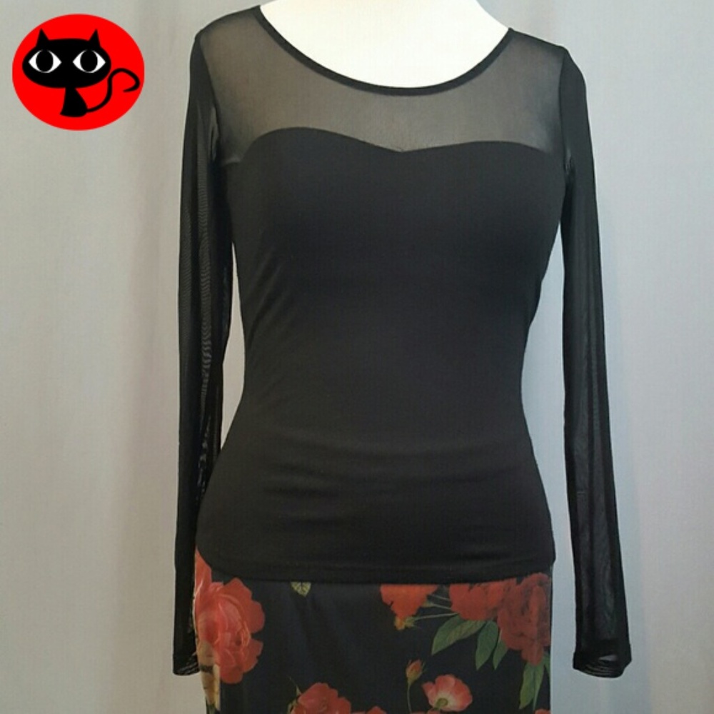 Sheer and solid sleeved top